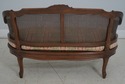 L64794EC: French Louis XV Cane Back Carved Settee