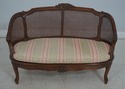 L64794EC: French Louis XV Cane Back Carved Settee