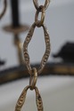F68663: French Empire 8 Arm Black & Brass Hanging 