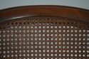 F73513: Vintage French Carved Cane Tub Chair