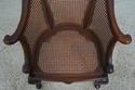F73513: Vintage French Carved Cane Tub Chair
