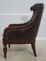 L72320: Pair Of Brown Tufted Leather Armchairs