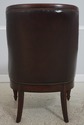 L72320: Pair Of Brown Tufted Leather Armchairs