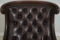 L72320: Pair Of Brown Tufted Leather Armchairs