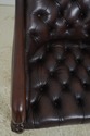 L72320: Pair Of Brown Tufted Leather Armchairs