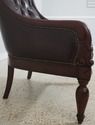 L72320: Pair Of Brown Tufted Leather Armchairs