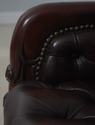 L72320: Pair Of Brown Tufted Leather Armchairs