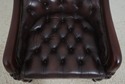 L72320: Pair Of Brown Tufted Leather Armchairs