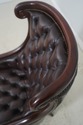 L72320: Pair Of Brown Tufted Leather Armchairs