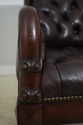 L72320: Pair Of Brown Tufted Leather Armchairs