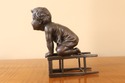 LF37329EC: Bronze Boy On Stool Sculpture