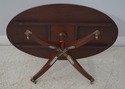 64415EC: English Elliptical Mahogany Coffee Table