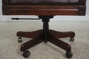 L73020: SAM MOORE Rolling Leather Desk Chair