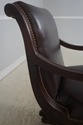 L73020: SAM MOORE Rolling Leather Desk Chair