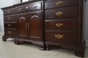 F70768: THOMASVILLE Cherry Triple Dresser w. Trifo