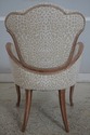L70831: Pair ARMAND RATEAU Inspired Upholstered Fi