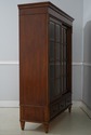 75325: ETHAN ALLEN Cherry Sliding Door Bookcase