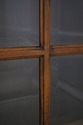 75325: ETHAN ALLEN Cherry Sliding Door Bookcase
