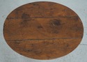 75523: DON RUSEAU Distressed Finish Tilt Top Table