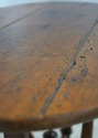 75523: DON RUSEAU Distressed Finish Tilt Top Table