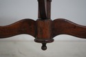75523: DON RUSEAU Distressed Finish Tilt Top Table