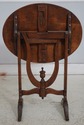 75523: DON RUSEAU Distressed Finish Tilt Top Table