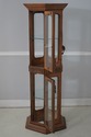 F75230: Walnut Finish 2 Door Hexagonal Curio Displ
