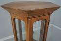 F75230: Walnut Finish 2 Door Hexagonal Curio Displ