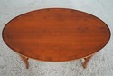 L74897: English Yew Wood Oval Coffee Cocktail Tabl