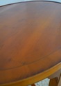 L74897: English Yew Wood Oval Coffee Cocktail Tabl