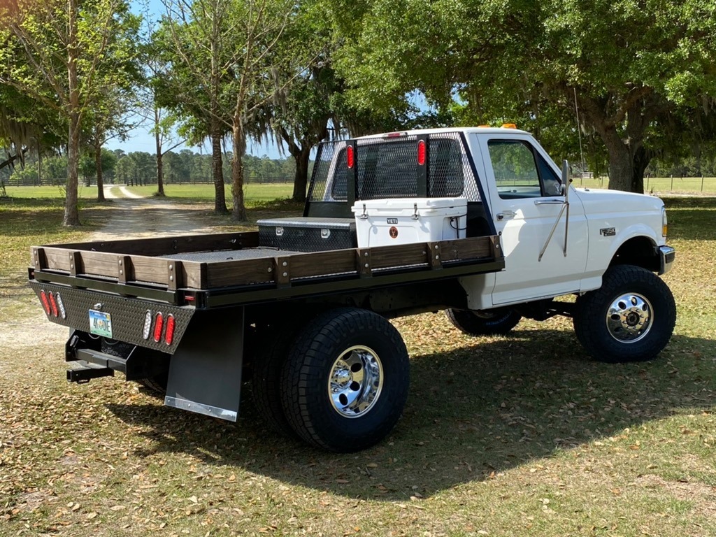 4) 16" FORD F350 LUG (ALCOA STYLE) DUALLY POLISHED 98 AND OLDER W/ LUGS