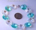 m/w Swarovski AB Logo + Aqua Sterling Bracelet or 