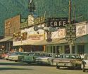 JACKSON WY  DOWNTOWN VIEW OLD CARS COWBOY BAR, MUC