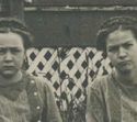 RPPc Unhappy Twin Girls Mary & Ruth Sit In Yard 19