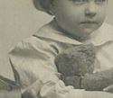 RPPc Innocent Young Girl Holding Steiff Teddy Bear